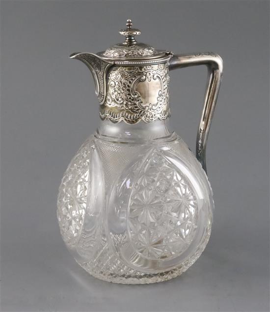 A late Victorian silver mounted cut glass claret jug, Z. Barraclough & Sons, 21.5cm.